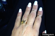Is This A Trend? Kim Kardashian Wears Kanye West's Initials On Her Wedding Finger