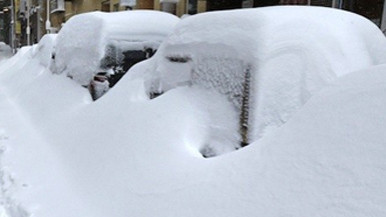 Snow-covered cars