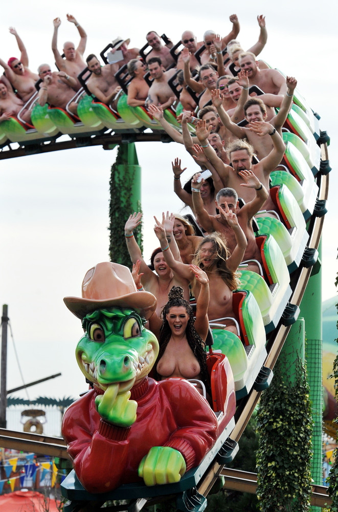 Nick Ansell/PA Wire People take part in a naked roller coaster ride record ...
