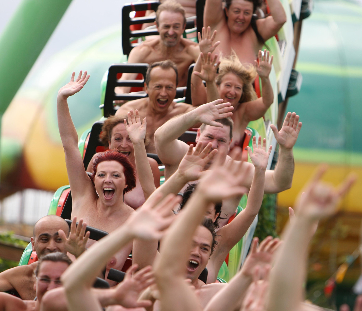 Chris Radburn/PA Archive Thrill seekers ride naked on the Green Scream roll...