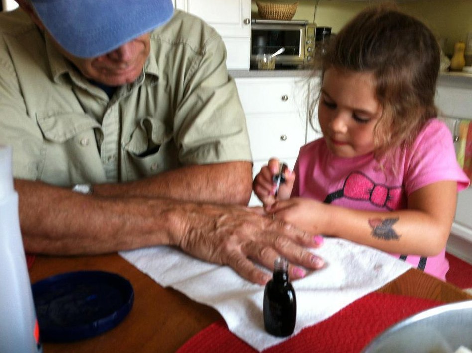 giving grandpa a manicure