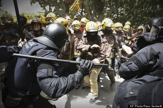 firefighters riot police austerity protest
