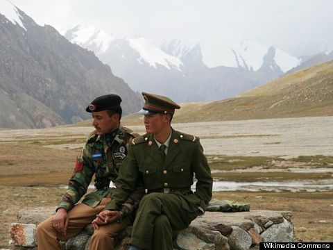 china pakistan guards hold hands