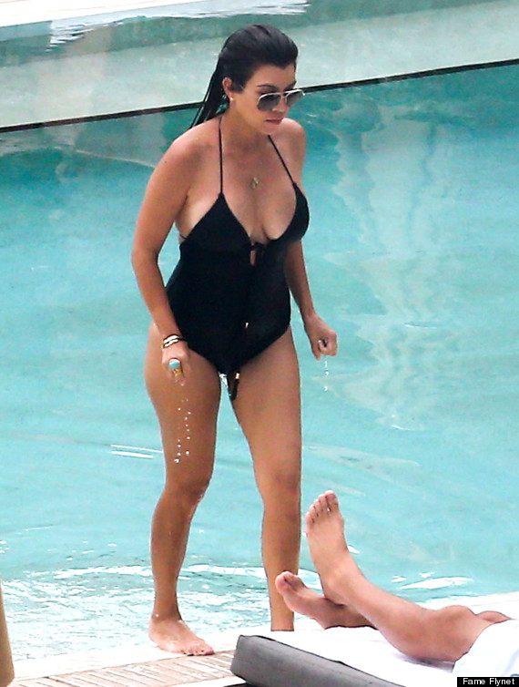 Kourtney Kardashian's Plunging One-Piece Swimsuit Featured the Biggest  Bump-Baring Cutout