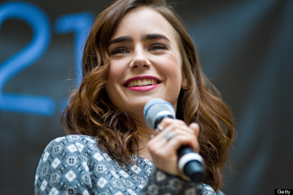 Lily Collins Shows Skin In Crop Top Huffpost 