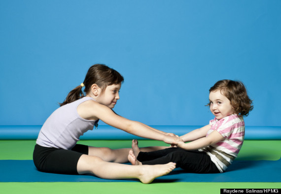 Josephine Jacob Gets Her Sons Involved in Yoga Poses in Adorable Photos