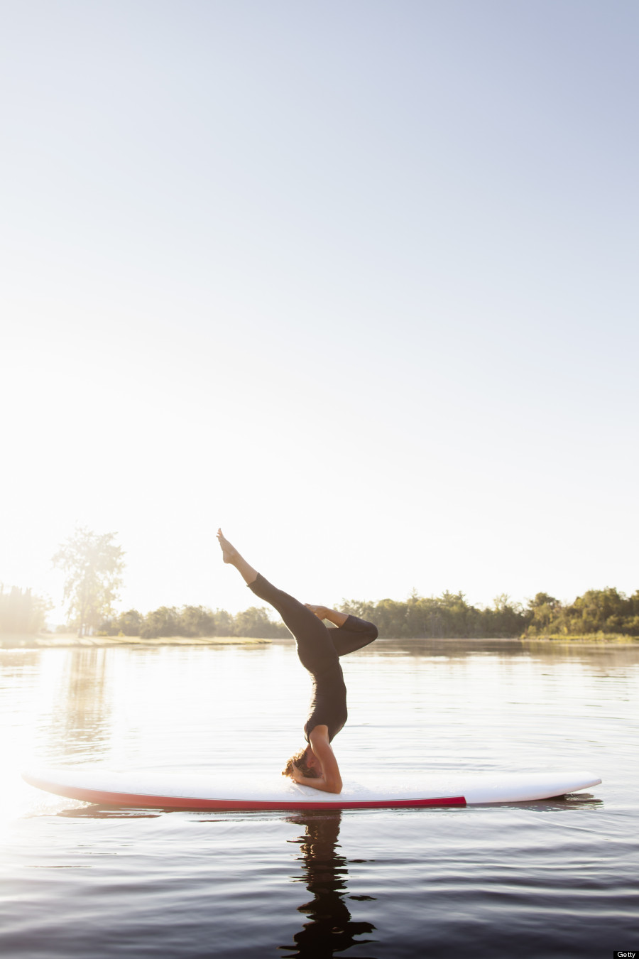 Here's How You Get Fit on the Water With Paddleboard Yoga - YOGA PRACTICE