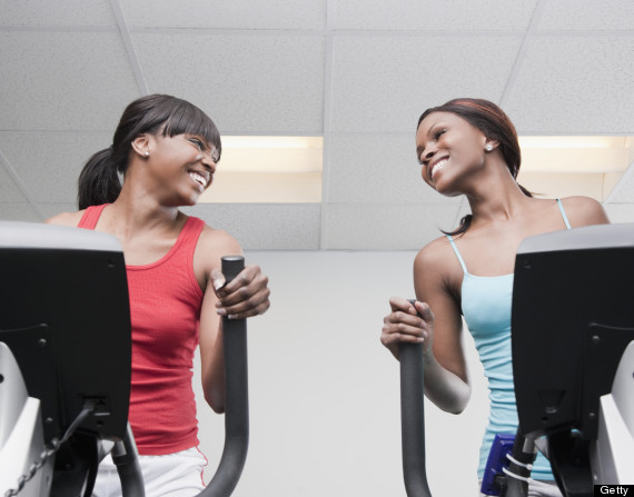 friends talking in gym