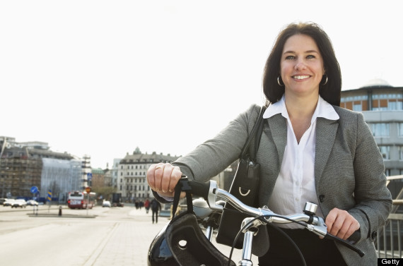 woman biking to work