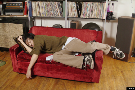 man laying on couch