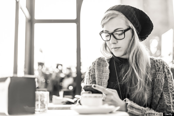 texting and drinking coffee