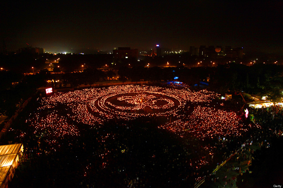 thousands of indian hindu devotees light candles