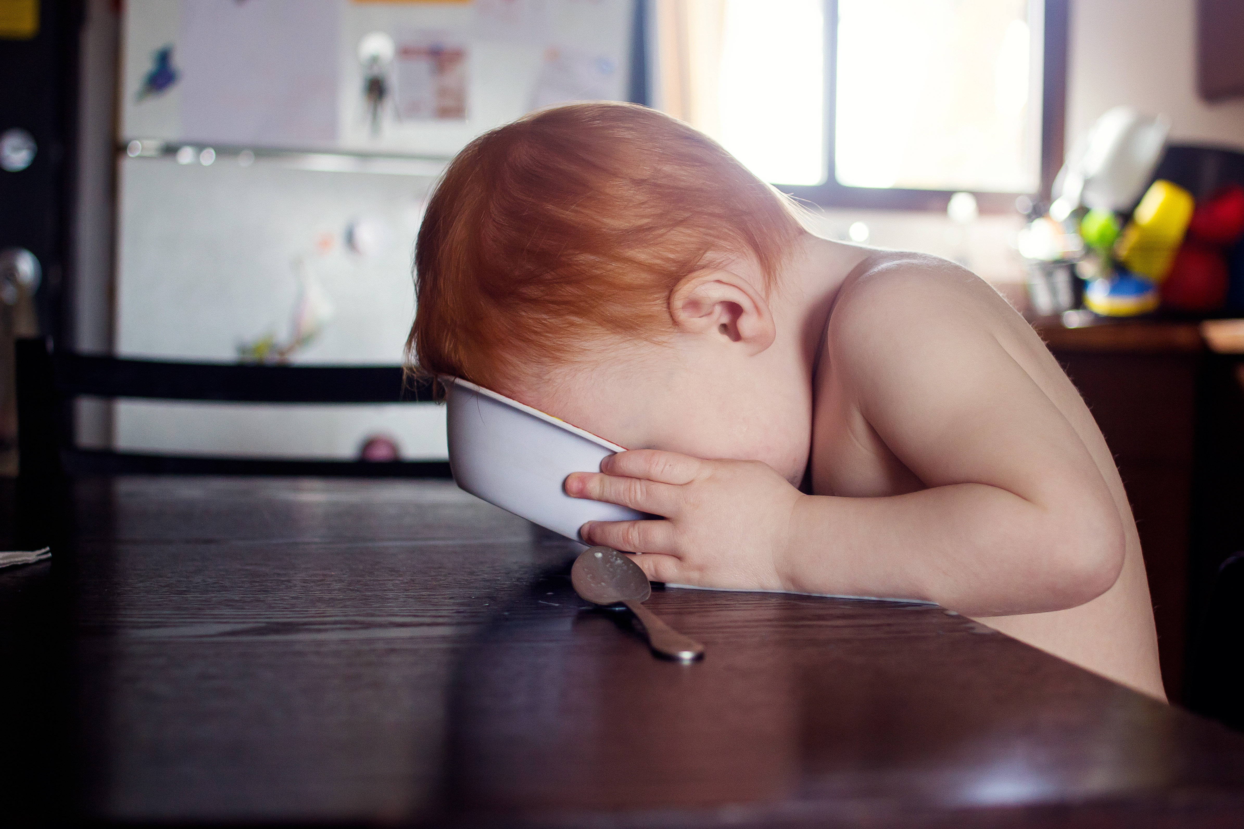 baby eating cereal