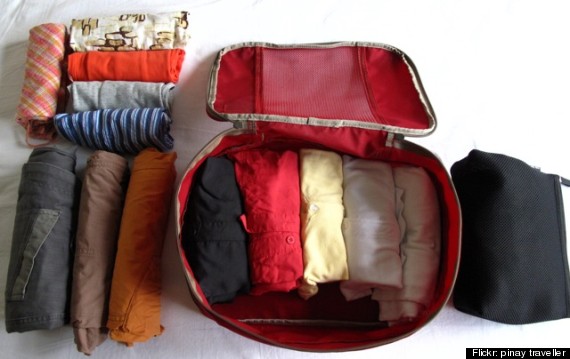 rolled clothes suitcase