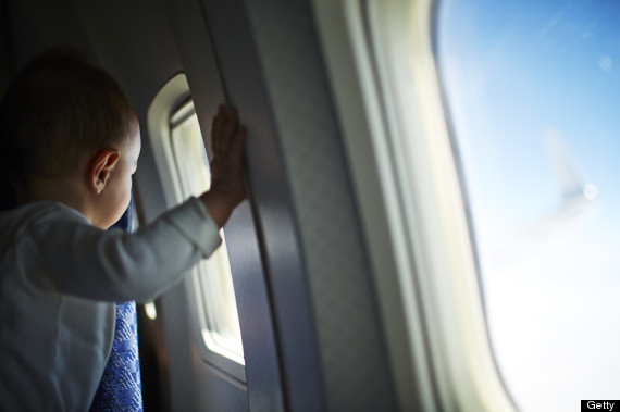 kid flying on a plane for the first time