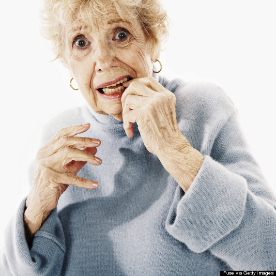 older person biting their nails