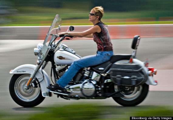 woman riding a harley davidson