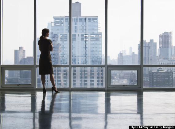 woman office looking out