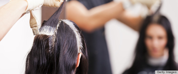 woman coloring hair