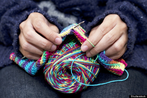 hands knitting blanket