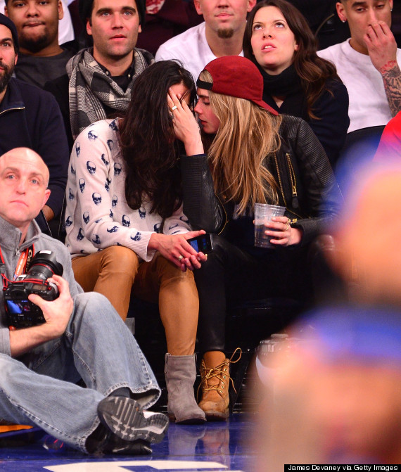 Selena Gomez kisses Cara Delevingne at Knicks game