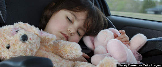 toddler sleeping in car