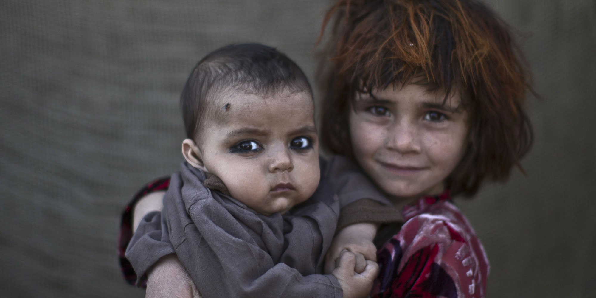 21 Haunting Portraits Of Afghanistan's Refugee Children Living In The ...