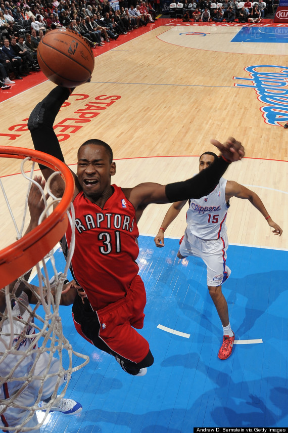 Toronto Raptors guard Terrence Ross dunks against the New York Knicks  during the first half of an NBA basketball game in Toronto on Sunday, Dec.  21, 2014. (AP Photo/The Canadian Press, Frank