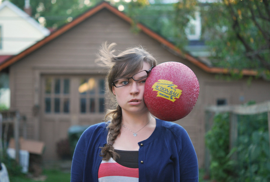 photo-series-captures-random-objects-flying-at-a-woman-s-head-because