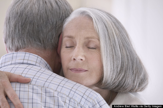 older couple cuddling