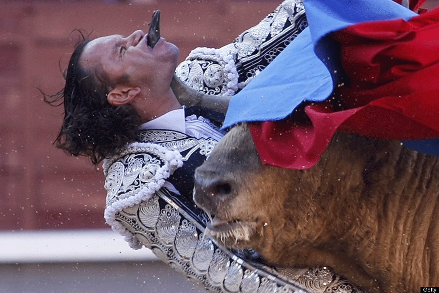 Matador Gets Horn Through Mouth