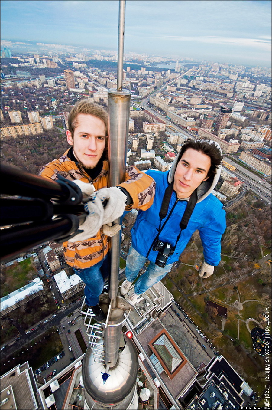 Russian Daredevil Takes Insane Selfies Dangling From The Top Of High