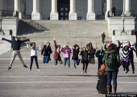 tourists jumping