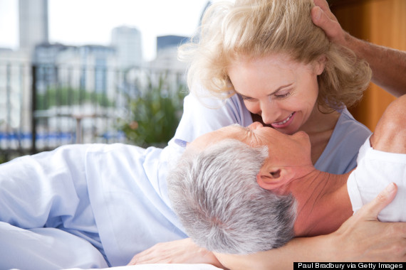 mature couple in bed