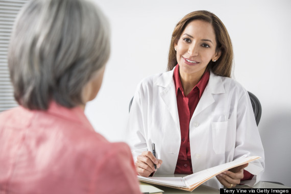 older woman talking to doctor