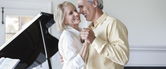 mature couple holding hands