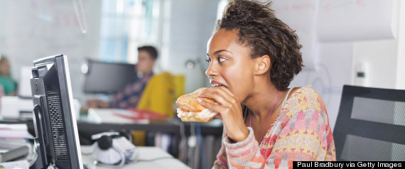 black woman eating desk