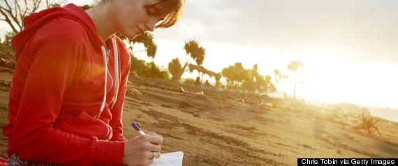 woman writing in journal