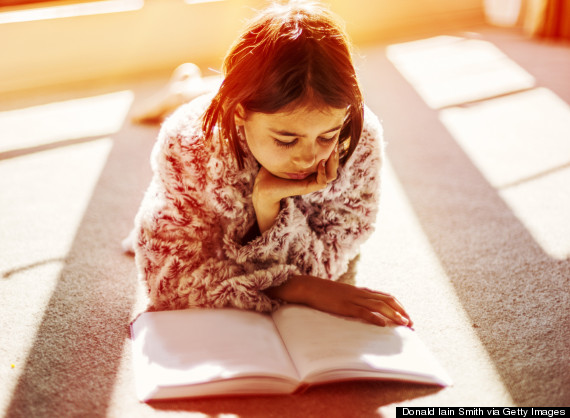 indian girl reading a book