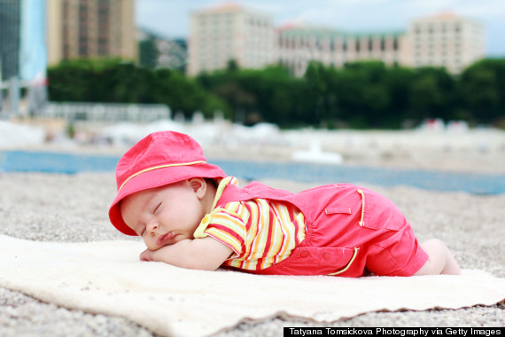 baby sleeping beach