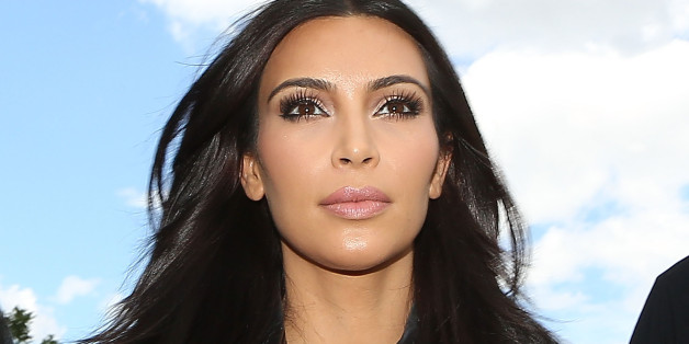 Kim Kardashian Wears A Leather Dress While Sightseeing In Paris