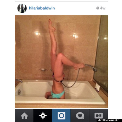 Hilaria Baldwin performs headstand in bikini and heels while doing