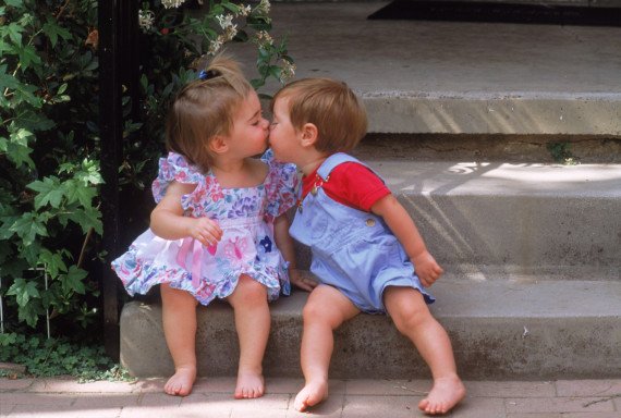 little boy playing with little girl