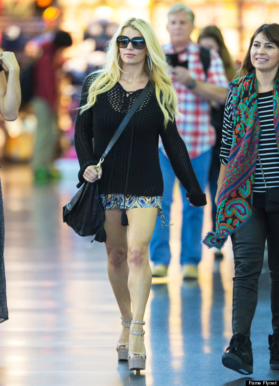 Jessica Simpson Opts For Teeny Shorts And Sky-High Heels At The Airport
