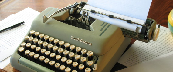 typing a paper on a typewriter