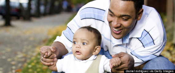 dad holding kid