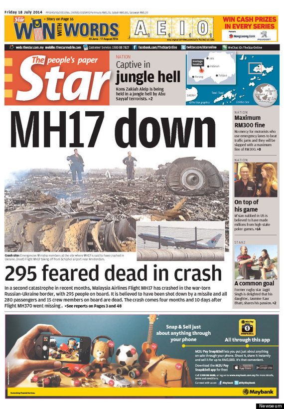 Newspaper Front Pages Show Devastating Images Of Malaysian Plane Crash