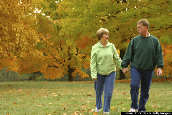 older couple exercising in fall