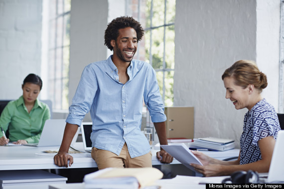 male coworkers laughing