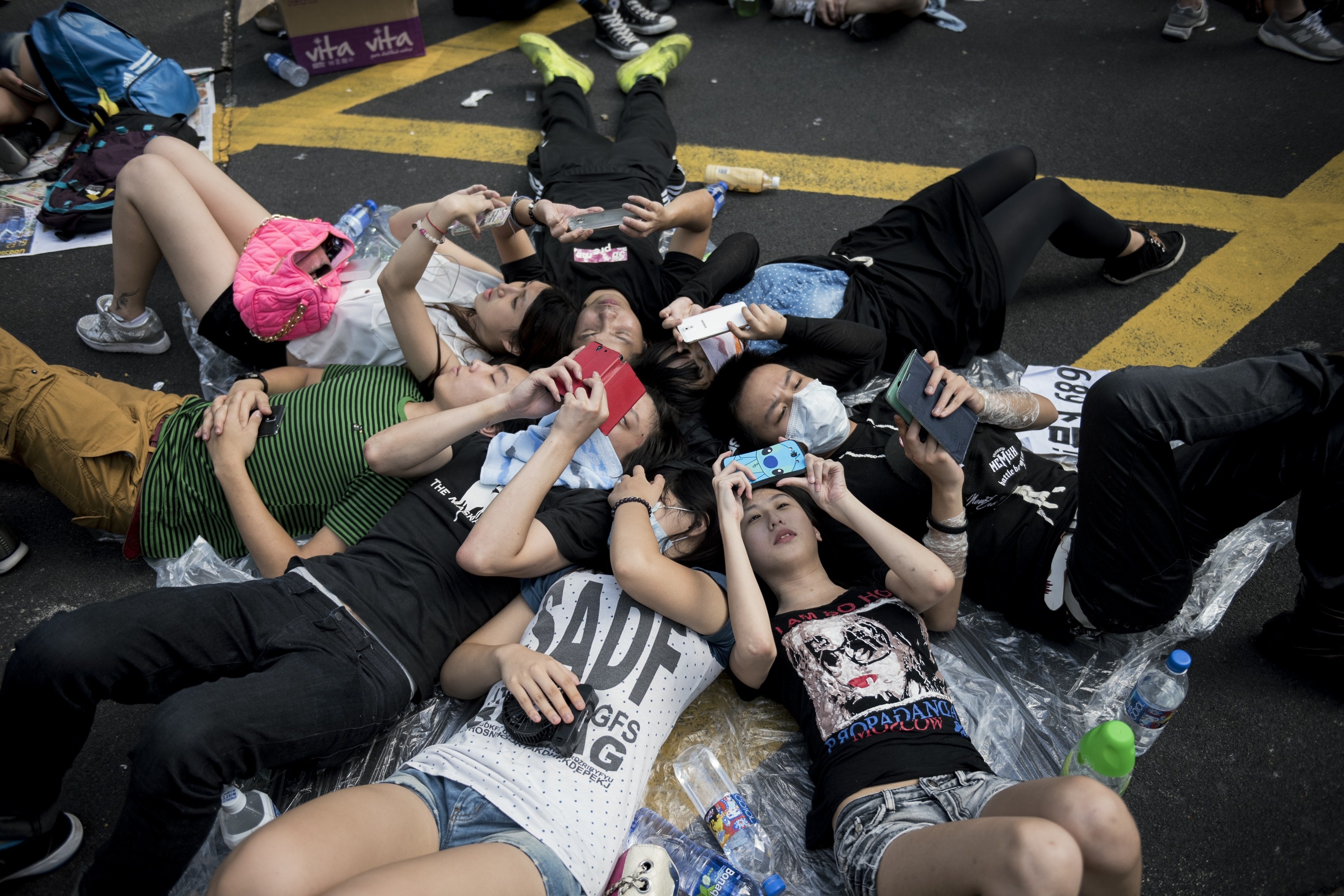 hong kong protestors cell phones